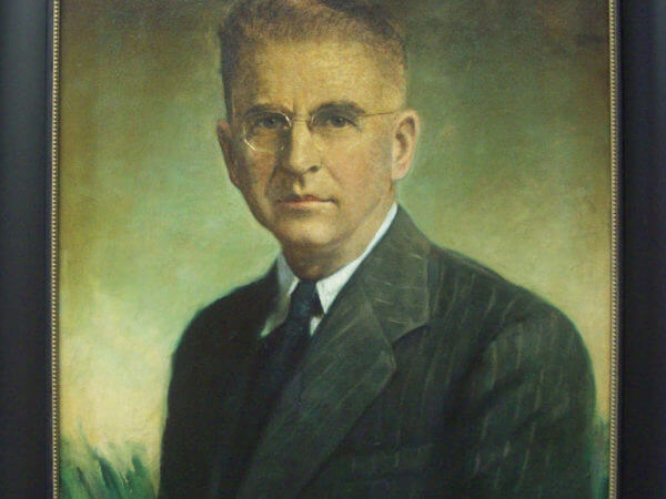 Painted portrait of WD Matthews framed