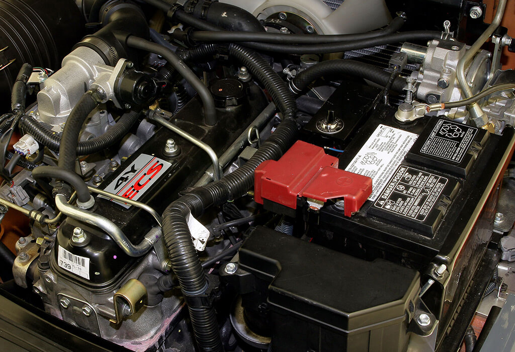 A close up of an industrial battery in an engine