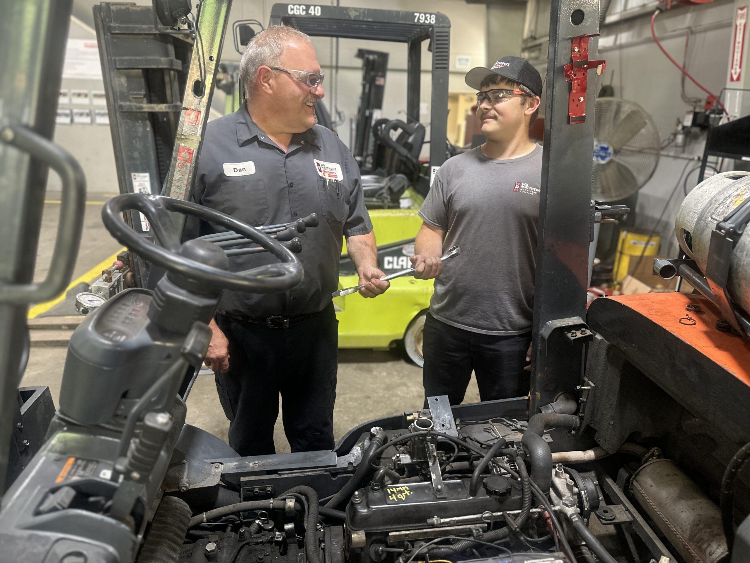 “High school apprentice learning heavy equipment maintenance through the W.D. Matthews Registered Apprenticeship Program.”